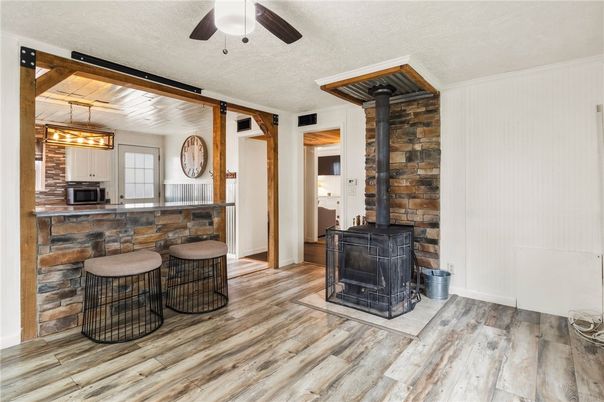 Fireplace, Interior, Pendant Lights, Wood Texture Flooring, Wooden Walls