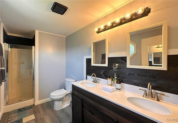 Bathroom, Dual Sink Vanities, Glass Shower, Interior, Wood Texture Flooring