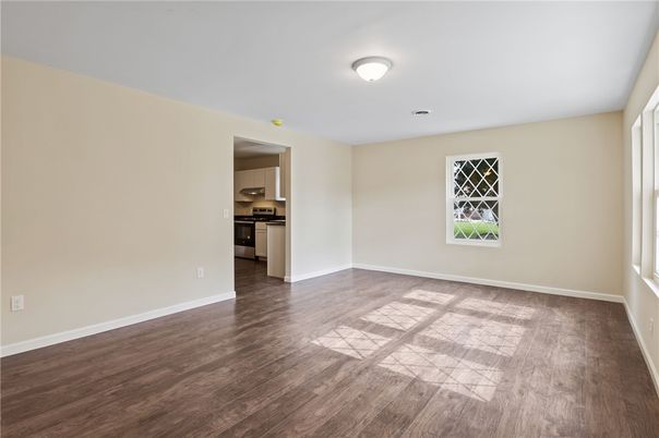 Empty room, Interior, Kitchen, Stainless Steel Appliances, Wood Texture Flooring