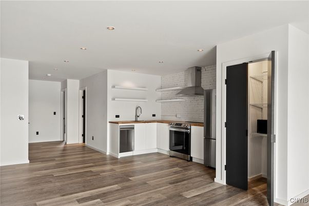 Interior, Kitchen, Recessed Lighting, Stainless Steel Appliances, Wood Texture Flooring