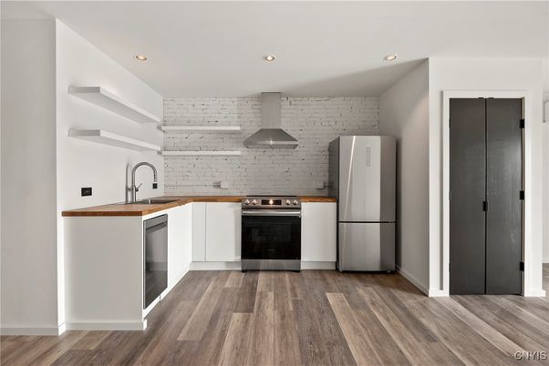 Interior, Kitchen, Recessed Lighting, Stainless Steel Appliances, Wood Texture Flooring