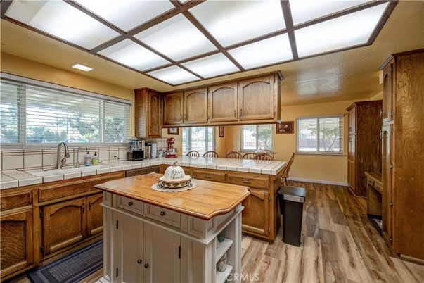 Interior, Kitchen, Tile Countertops, Wood Texture Flooring