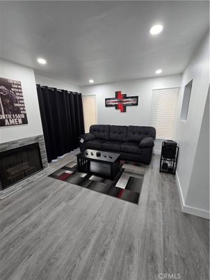 Fireplace, Interior, Living room, Recessed Lighting, Wood Texture Flooring