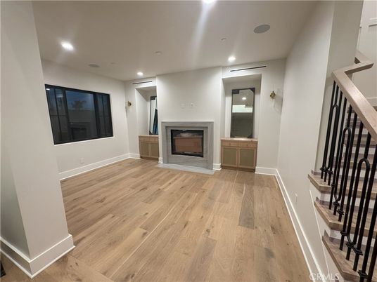 Empty room, Fireplace, Interior, Recessed Lighting, Wood Texture Flooring