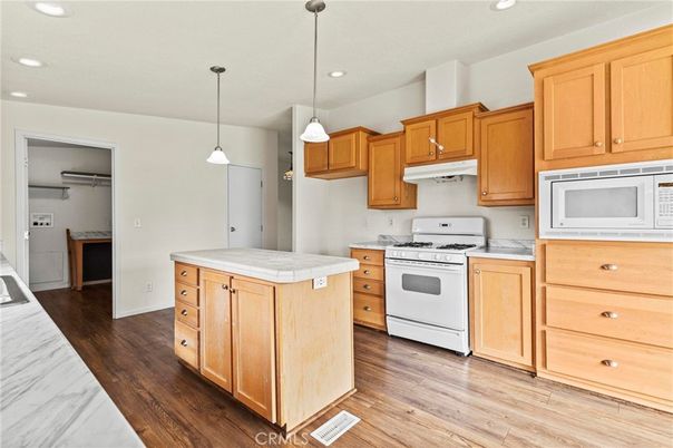 Interior, Kitchen, Pendant Lights, Recessed Lighting, Tile Countertops, Wood Texture Flooring