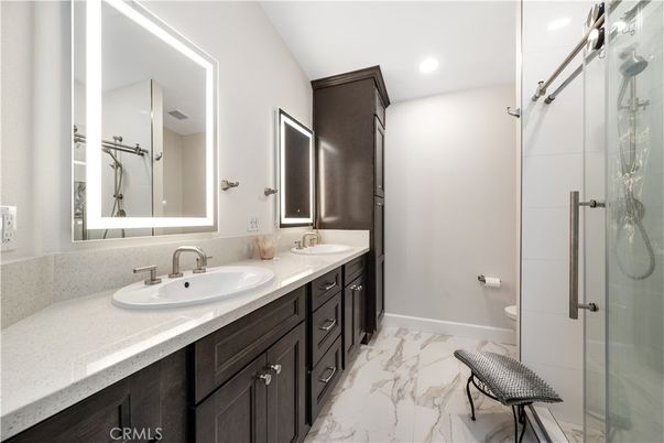 Bathroom, Dual Sink Vanities, Glass Shower, Interior, Marble, Recessed Lighting