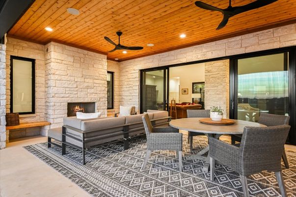 Fireplace, Interior, Living room, Recessed Lighting, Stone Walls, Wooden Ceilings