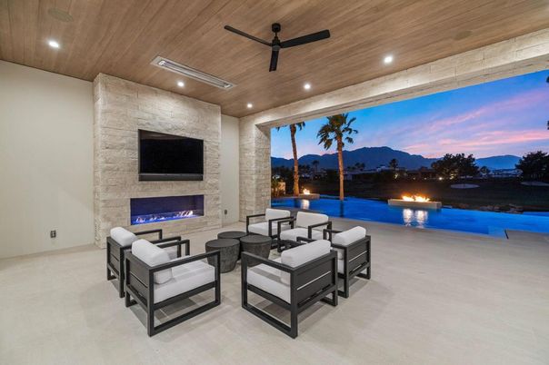 Fireplace, Interior, Living room, Pool, Recessed Lighting, Stone Walls, Wooden Ceilings