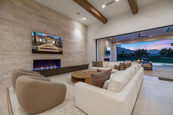 Fireplace, Interior, Living room, Recessed Lighting, Stone Walls, Water, Wooden Beams