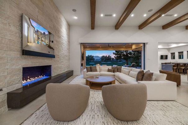 Dining room, Fireplace, Interior, Living room, Recessed Lighting, Stone Walls, Water, Wooden Beams