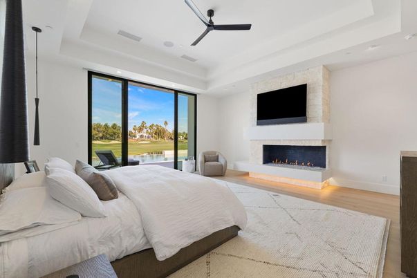 Bedroom, Fireplace, Interior, Recessed Lighting, Water, Wood Texture Flooring