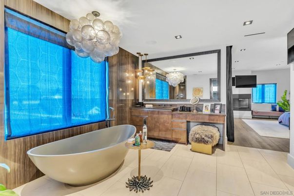 Bathroom, Chandelier, Free Standing Baths, Interior, Pendant Lights, Recessed Lighting, Wood Texture Flooring