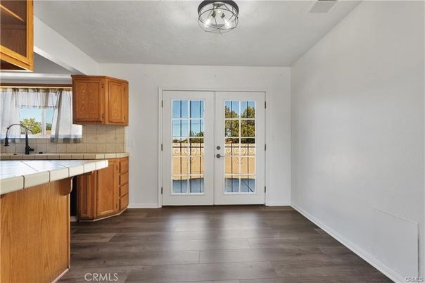 Interior, Kitchen, Tile Countertops, Wood Texture Flooring
