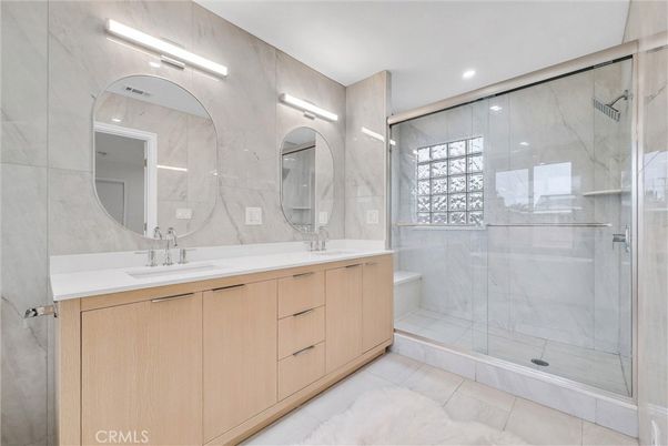 Bathroom, Dual Sink Vanities, Glass Shower, Interior, Marble Walls, Recessed Lighting