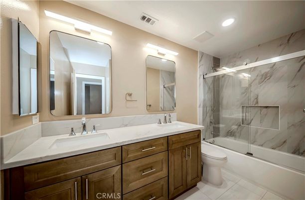 Bathroom, Dual Sink Vanities, Glass Shower, Interior, Marble Walls, Recessed Lighting