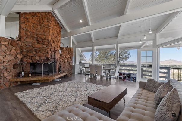 Dining room, Fireplace, Interior, Living room, Pendant Lights, Recessed Lighting, Stone Walls, Wood Texture Flooring
