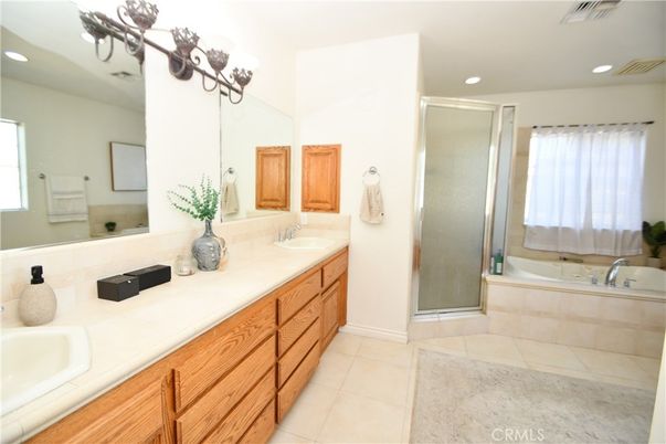 Bathroom, Dual Sink Vanities, Glass Shower, Interior, Recessed Lighting, Tile Countertops