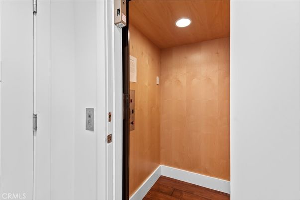 Elevator, Interior, Recessed Lighting, Wooden Ceilings, Wood Texture Flooring, Wooden Walls