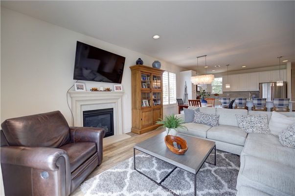 Chandelier, Dining room, Fireplace, Interior, Kitchen, Living room, Pendant Lights, Recessed Lighting, Wood Texture Flooring