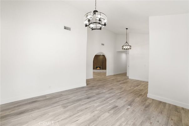 Empty room, Fireplace, Interior, Pendant Lights, Wood Texture Flooring