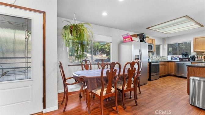 Dining room, Interior, Kitchen, Recessed Lighting, Stainless Steel Appliances, Wood Texture Flooring