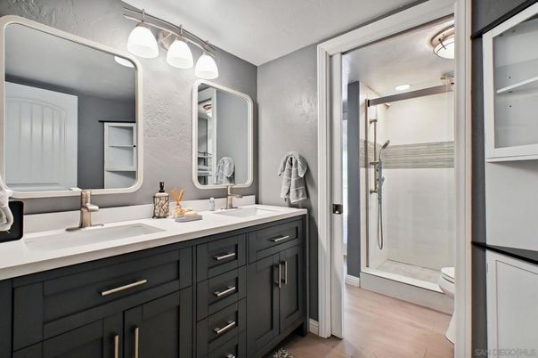 Bathroom, Dual Sink Vanities, Glass Shower, Interior, Wood Texture Flooring
