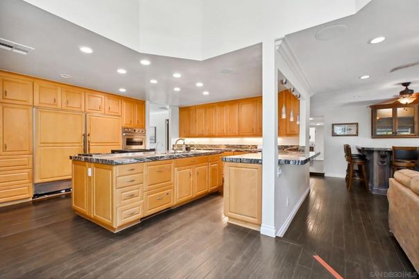 Interior, Kitchen, Recessed Lighting, Tile Countertops, Wood Texture Flooring