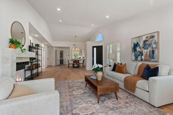 Chandelier, Dining room, Fireplace, Interior, Living room, Pendant Lights, Recessed Lighting, Wood Texture Flooring