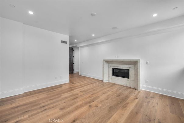 Empty room, Fireplace, Interior, Recessed Lighting, Wood Texture Flooring