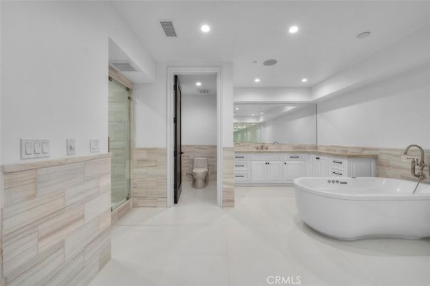 Bathroom, Dual Sink Vanities, Free Standing Baths, Glass Shower, Interior, Recessed Lighting