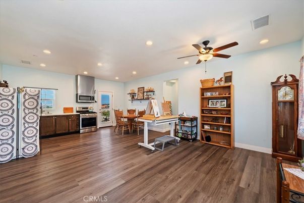 Dining room, Interior, Kitchen, Recessed Lighting, Stainless Steel Appliances, Wood Texture Flooring