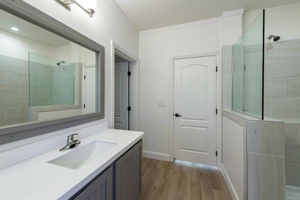 Bathroom, Glass Shower, Interior, Recessed Lighting, Wood Texture Flooring