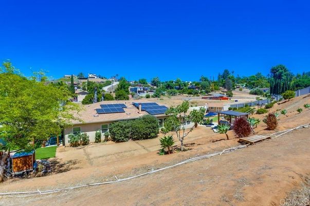 Exterior, Hot Tub, Solar Panels
