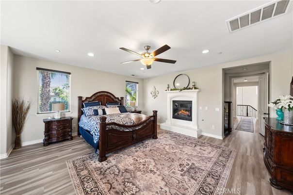 Bedroom, Fireplace, Interior, Recessed Lighting, Wood Texture Flooring