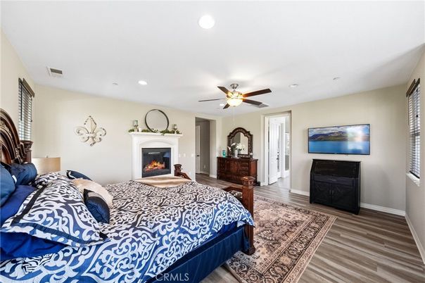 Bedroom, Fireplace, Interior, Recessed Lighting, Wood Texture Flooring