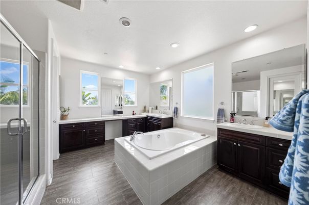 Bathroom, Dual Sink Vanities, Interior, Recessed Lighting, Wood Texture Flooring
