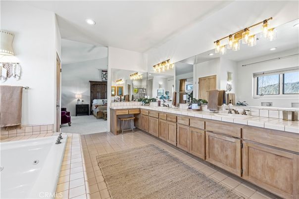 Bathroom, Dual Sink Vanities, Interior, Recessed Lighting, Tile Countertops
