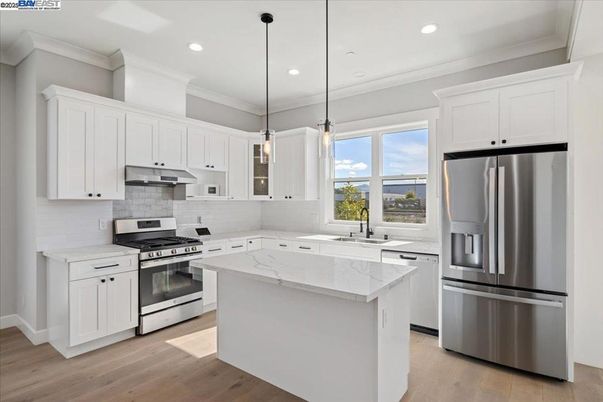 Interior, Kitchen, Pendant Lights, Recessed Lighting, Stainless Steel Appliances, Wood Texture Flooring