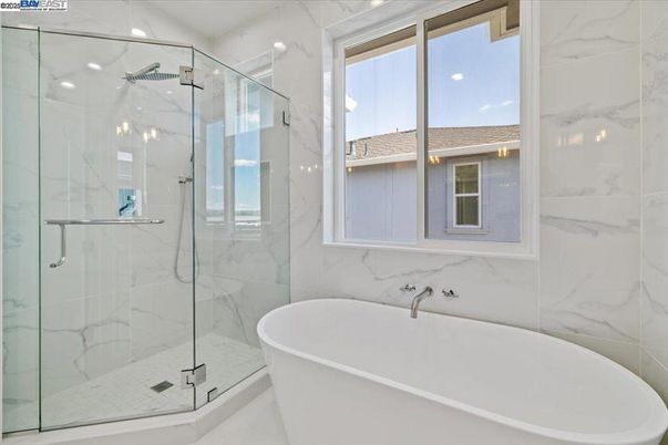 Bathroom, Free Standing Baths, Glass Shower, Interior, Marble Walls, Recessed Lighting