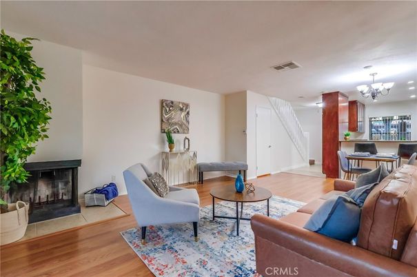 Chandelier, Fireplace, Interior, Living room, Recessed Lighting, Wood Texture Flooring