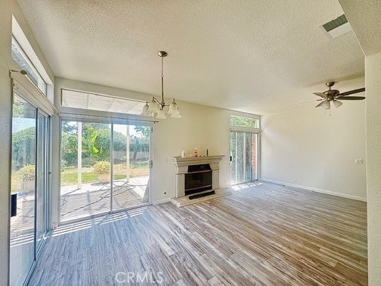 Empty room, Fireplace, Interior, Pendant Lights, Wood Texture Flooring