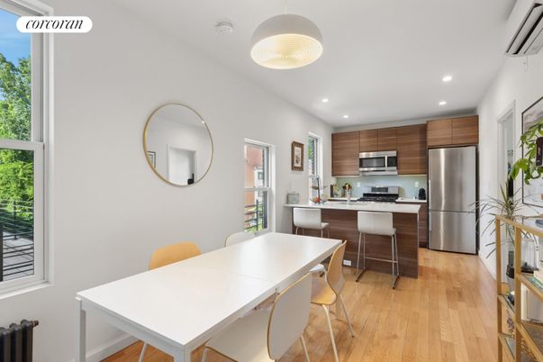 Dining room, Interior, Kitchen, Recessed Lighting, Stainless Steel Appliances, Wood Texture Flooring