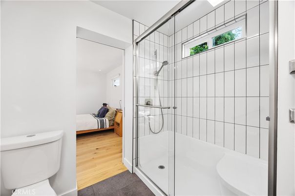 Bathroom, Bedroom, Glass Shower, Interior, Recessed Lighting, Wood Texture Flooring