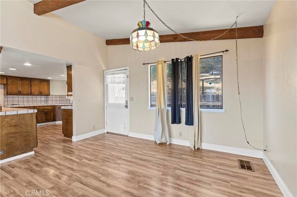 Interior, Kitchen, Pendant Lights, Recessed Lighting, Tile Countertops, Wood Texture Flooring