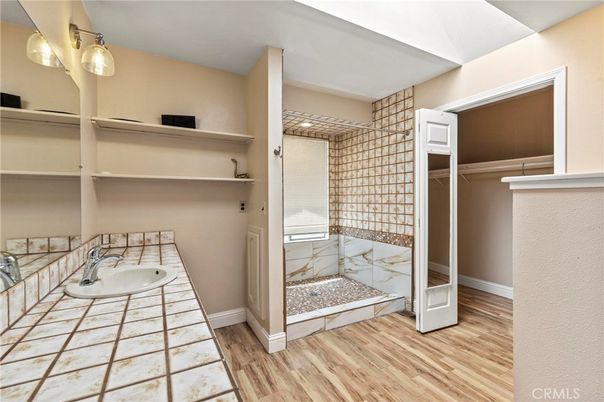 Bathroom, Glass Shower, Interior, Tile Countertops, Wood Texture Flooring