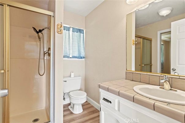 Bathroom, Glass Shower, Interior, Tile Countertops, Wood Texture Flooring