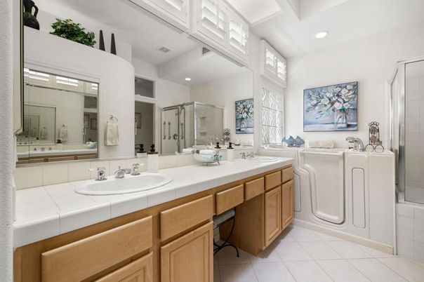 Bathroom, Dual Sink Vanities, Glass Shower, Interior, Recessed Lighting, Tile Countertops