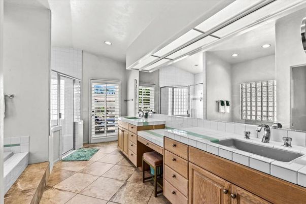Bathroom, Dual Sink Vanities, Glass Shower, Interior, Recessed Lighting, Tile Countertops