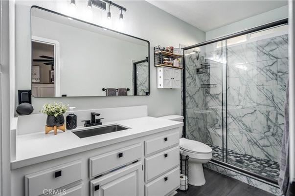 Bathroom, Glass Shower, Interior, Marble Walls, Wood Texture Flooring