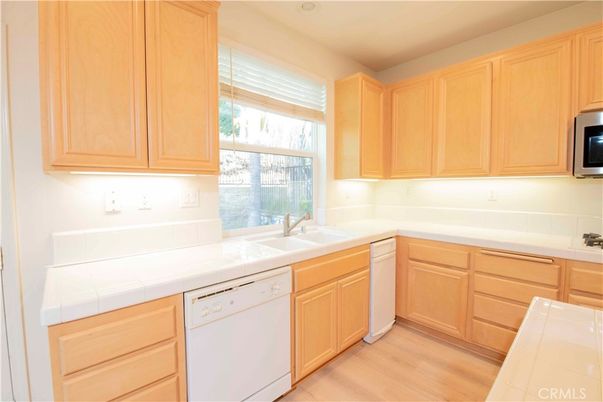 Interior, Kitchen, Tile Countertops, Wood Texture Flooring